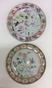 Two Chinese plates decorated with butterflies and