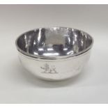 A Continental silver bowl with coin insert and cre