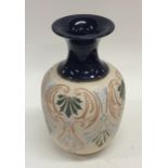 LANGLEY: A baluster shaped vase in cream with blue