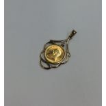 A 1997 1/10 Krugerrand pendant. Approx. 5.2 grams.