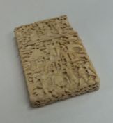 An Antique slide top ivory card case decorated wit
