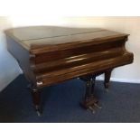 A mahogany grand piano on panelled tapering suppor