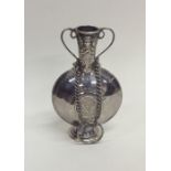 A Continental two handled silver vase on spreading