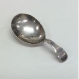 A large heavy fiddle pattern silver caddy spoon. L