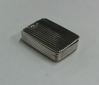 A small Georgian silver reeded snuff box with hing