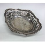 An Edwardian pierced silver bread dish with gadroo