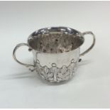 A heavy silver Georgian style silver porringer wit