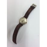 CENTRINA: A gent's 9 carat gold wristwatch on leat