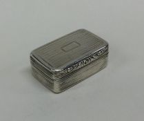 A heavy Georgian silver nutmeg grater with hinged