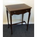 An Edwardian mahogany single drawer side table. Es