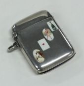 A novelty silver and enamel vesta case with hinged