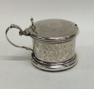 A Victorian engraved silver drum mustard with hing