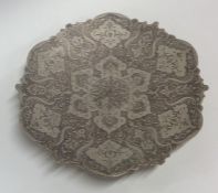 A circular Persian silver bonbon dish engraved wit