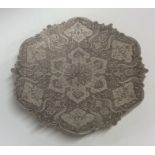 A circular Persian silver bonbon dish engraved wit