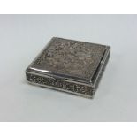An Indian rectangular silver box with hinged lid t