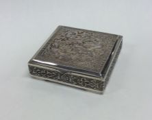 An Indian rectangular silver box with hinged lid t