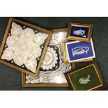 A box containing framed and glazed Honiton lace pa