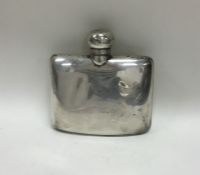 A hinged top kidney shaped silver hip flask with s