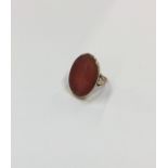 A large gent's cornelian signet ring. Approx. 8 gr