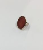 A large gent's cornelian signet ring. Approx. 8 gr