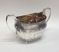 A good quality Georgian silver sugar bowl with flo