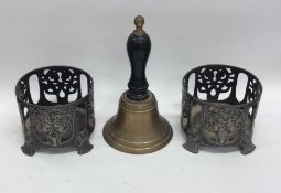 A pair of stylish WMF pewter bottle coasters toget