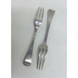 A pair of Antique silver three prong forks of OE p