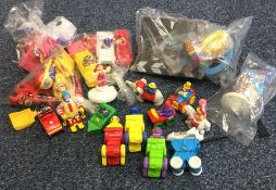 A set of four unwrapped 'Airport' McDonald's toys