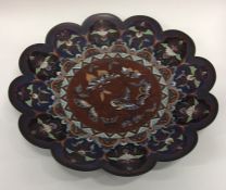 A cloisonné shallow dish attractively decorated wi
