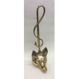 A heavy brass door stop in the form of a fox. Est.