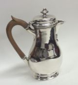 An Edwardian silver baluster shaped slim water jug