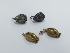 A good pair of Antique silver mounted earrings of