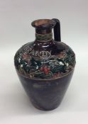 A Royal Doulton Christmas brandy flask decorated w