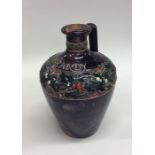 A Royal Doulton Christmas brandy flask decorated w