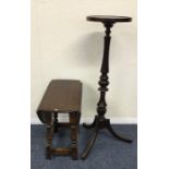 A small oak drop leaf occasional table together wi