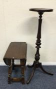 A small oak drop leaf occasional table together wi