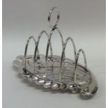 A good quality Edwardian silver toast rack with sw