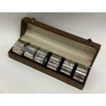 A good quality boxed set of six silver napkin ring