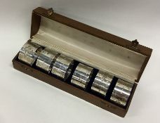 A good quality boxed set of six silver napkin ring
