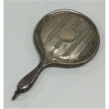 A miniature silver mounted handbag mirror. Birming