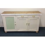 A Victorian pine three door sideboard. Est. £30 -