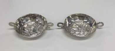 A pair of Continental silver miniature sweet dishe