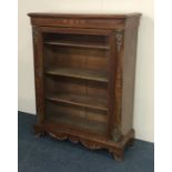 A Victorian inlaid and brass mounted Pier cabinet