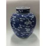 A tall blue and white Chinese baluster shaped vase