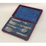 A French silver four piece preserve set with flute
