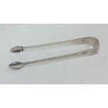 A pair of Georgian silver bright cut sugar tongs.