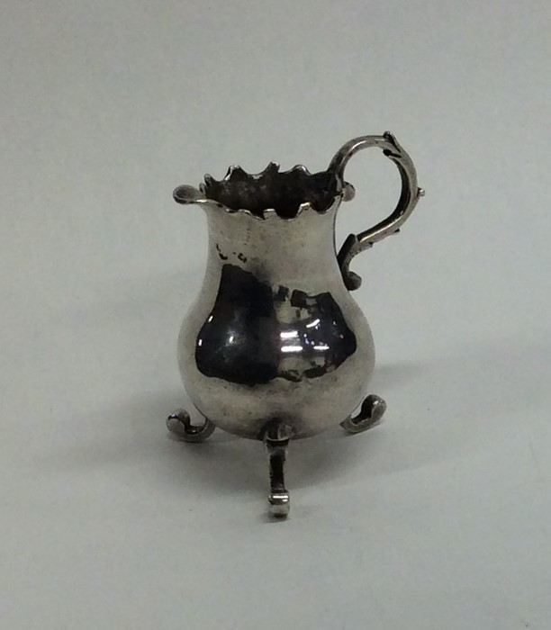 A rare miniature 18th Century Dutch ewer with scro