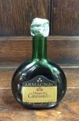 A 35 cl bottle of Marquis de Caussade Armagnac. (1