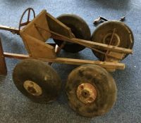 A handmade vintage go-kart made from possibly 'Spi