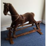 An old rocking horse. Est. £20 - £30.